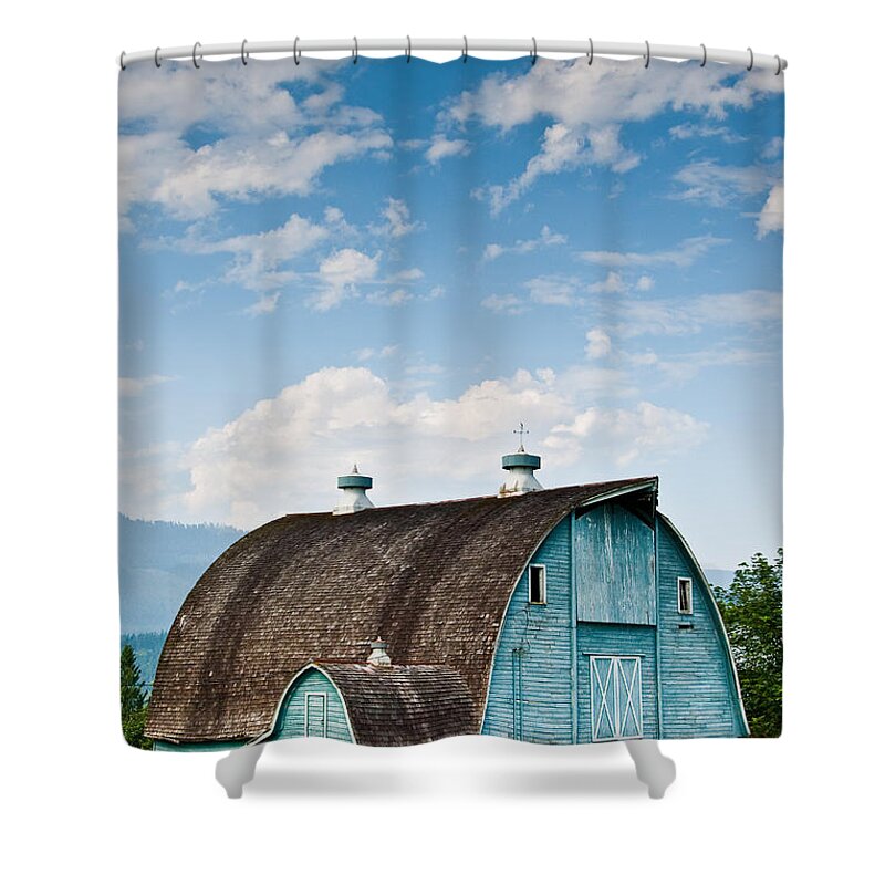 Agricultural Activity Shower Curtain featuring the photograph Blue Barn in the Stillaguamish Valley by Jeff Goulden