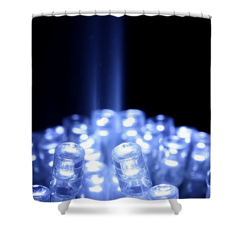Abstract Shower Curtain featuring the photograph Blue LED lights with light beam by Simon Bratt