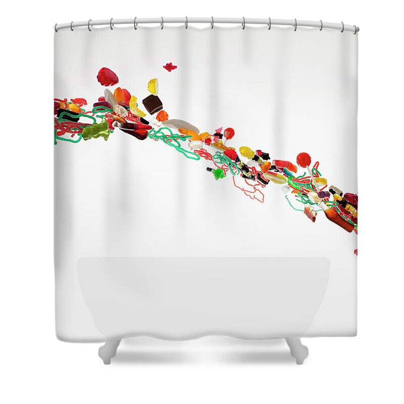 Curve Shower Curtain featuring the photograph Candy Against A White Background by Dual Dual