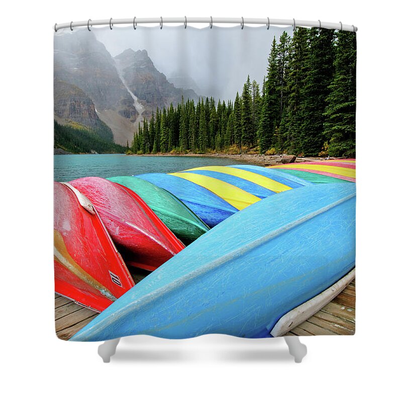 Scenics Shower Curtain featuring the photograph Canoes Line Dock At Moraine Lake, Banff by Wildroze