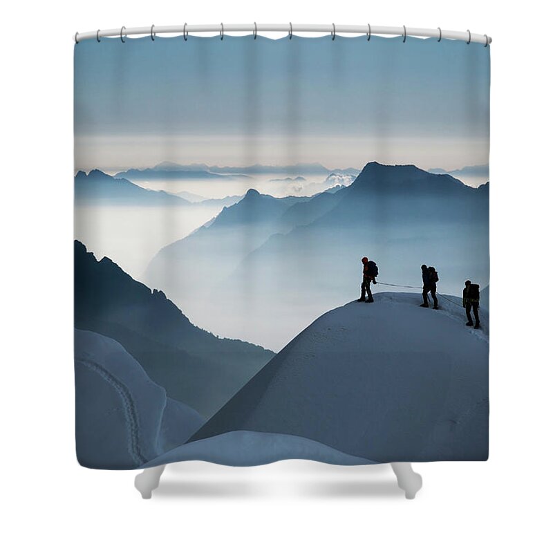Young Men Shower Curtain featuring the photograph Climbing Team On A Snowy Ridge by Buena Vista Images