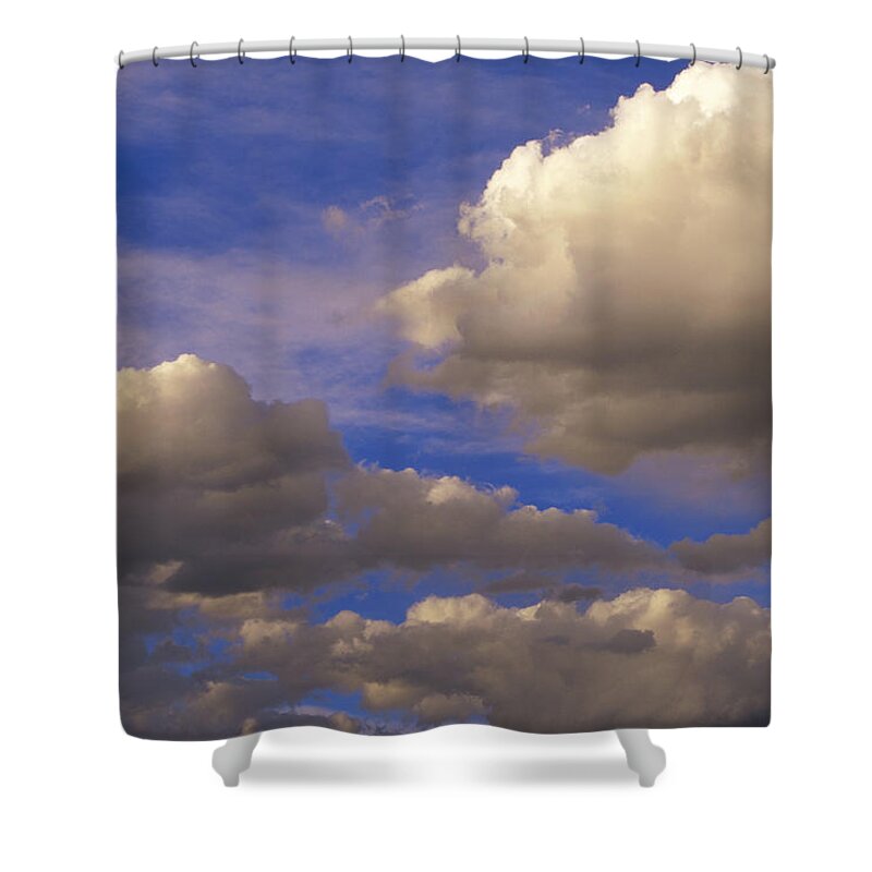 00170086 Shower Curtain featuring the photograph Colorful Clouds Against Blue Sky by Tim Fitzharris