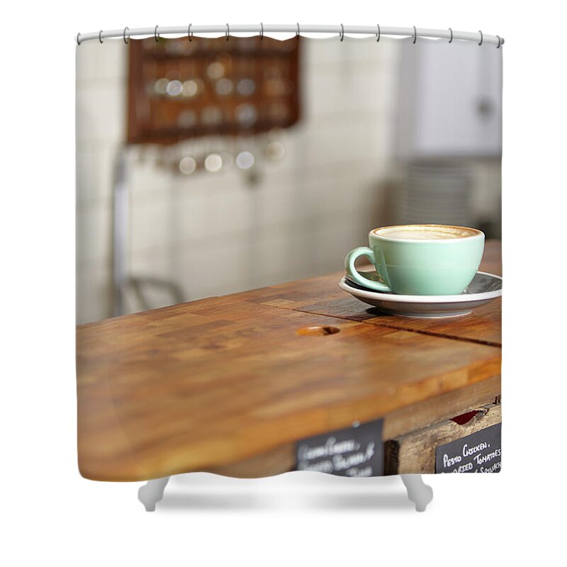 Single Object Shower Curtain featuring the photograph Cup Of Coffee In A Mint Green Mug by Ezra Bailey