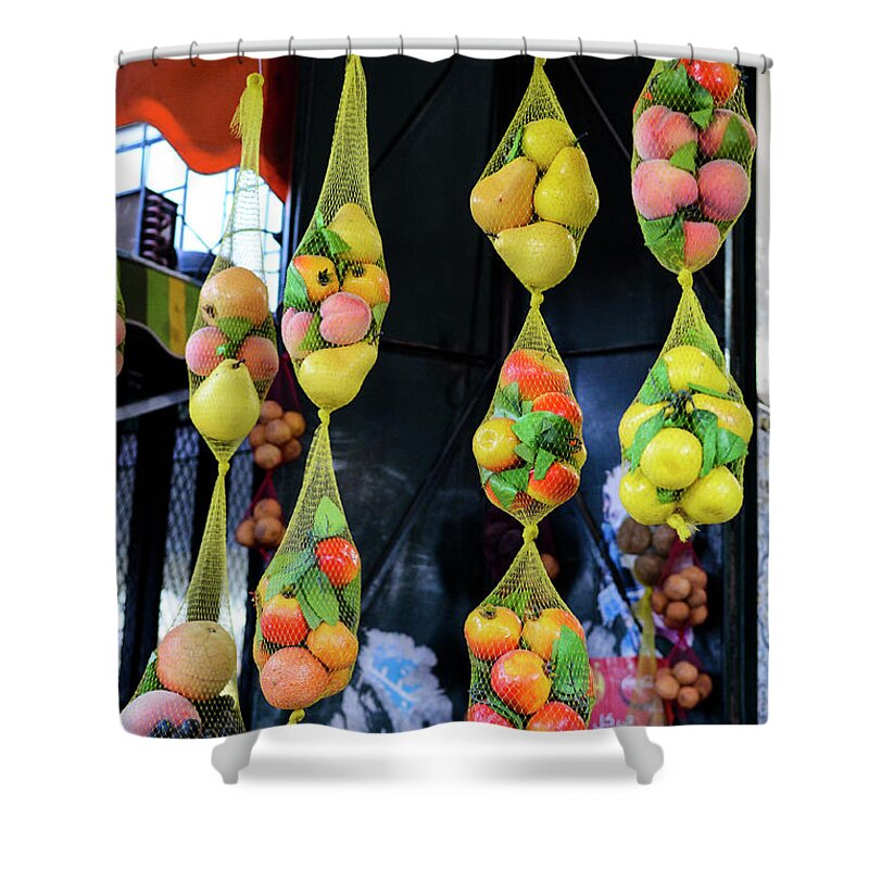 Hanging Shower Curtain featuring the photograph Fruits Hanging From A Market Stall by Paolo Negri