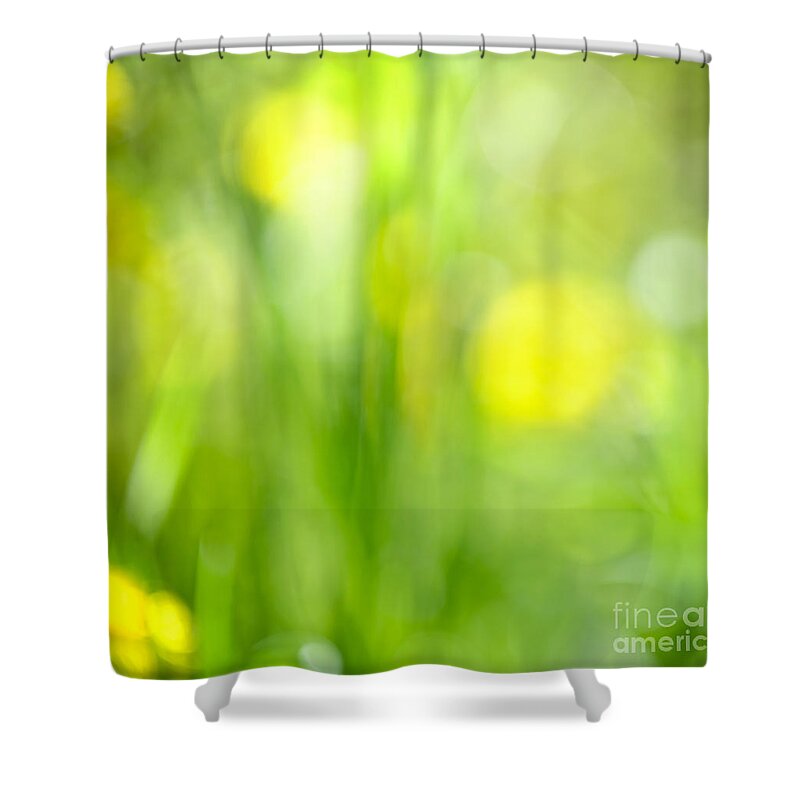 Green Shower Curtain featuring the photograph Green grass with yellow flowers abstract by Elena Elisseeva