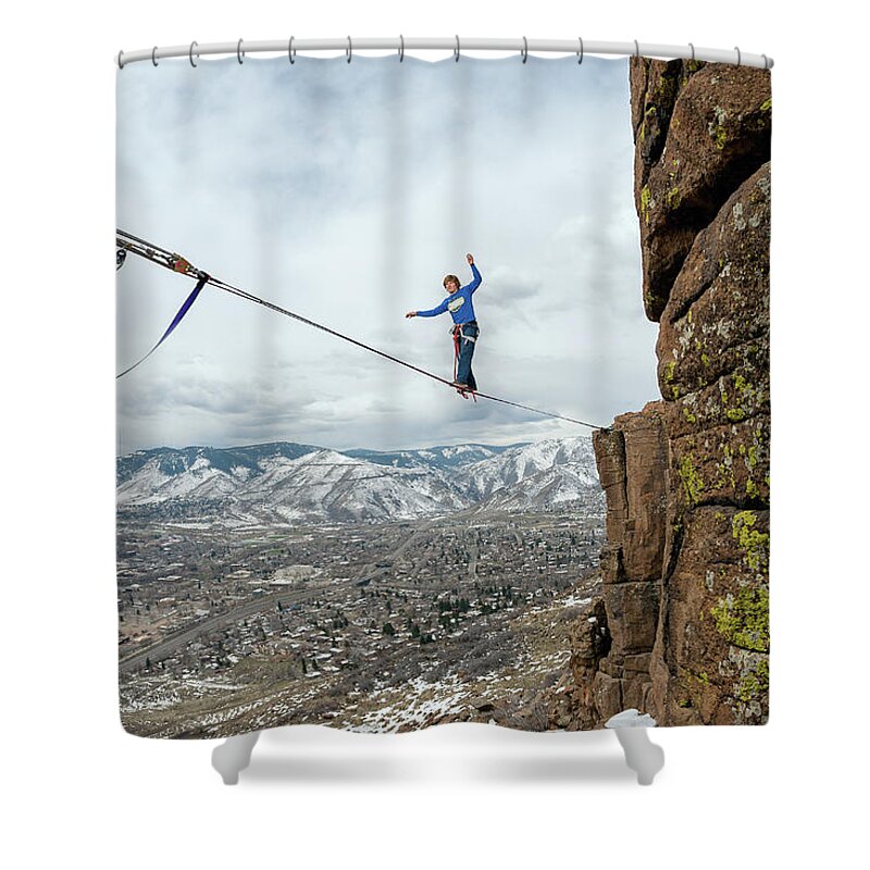 Scenics Shower Curtain featuring the photograph Guy Walking On A Rope Over A Town by Daniel Milchev