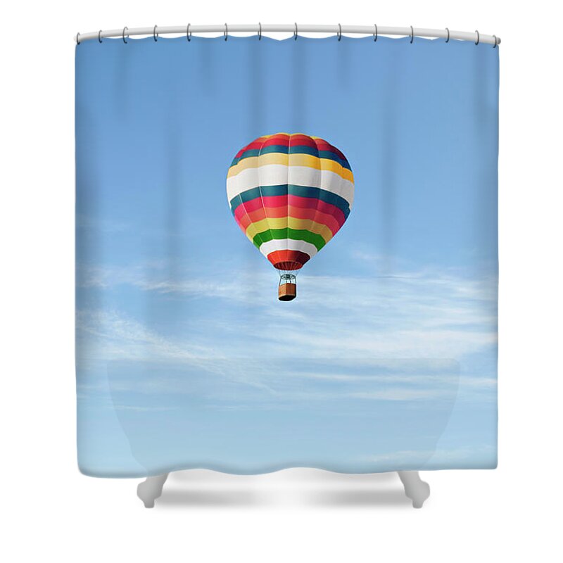 Hot Air Balloon Shower Curtain featuring the photograph Hot Air Ballon Against Blue Sky by Luxx Images
