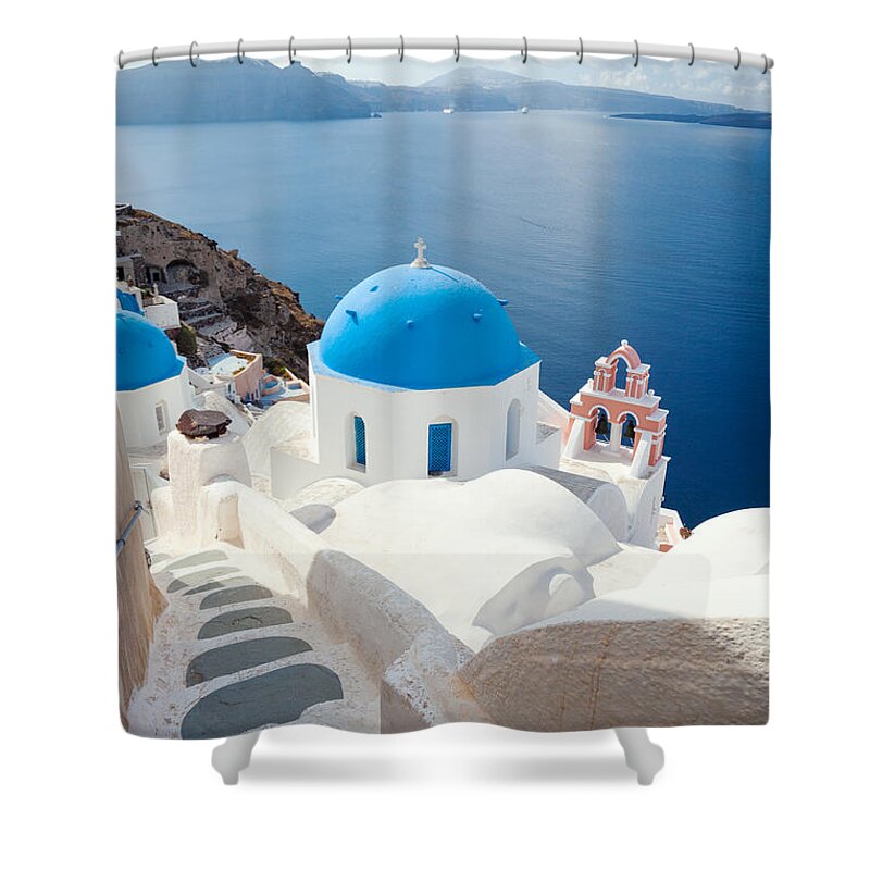 Santorini Shower Curtain featuring the photograph Iconic blue domed churches in Santorini - Greece by Matteo Colombo
