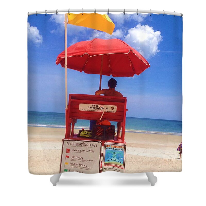 Life Guard Shower Curtain featuring the photograph It's a yellow flag day.... by WaLdEmAr BoRrErO