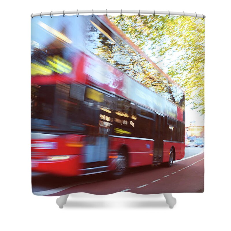 English Culture Shower Curtain featuring the photograph London Red Double Decker Bus Driving At by Pavliha