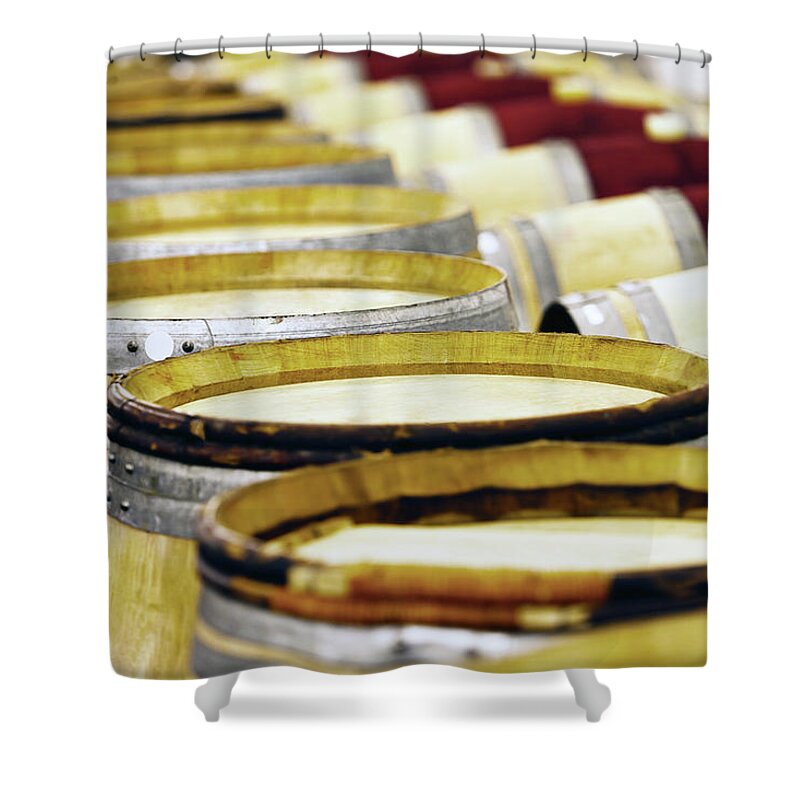 Alcohol Shower Curtain featuring the photograph Long Rows Of Oak Barrels For Maturing by Rapideye