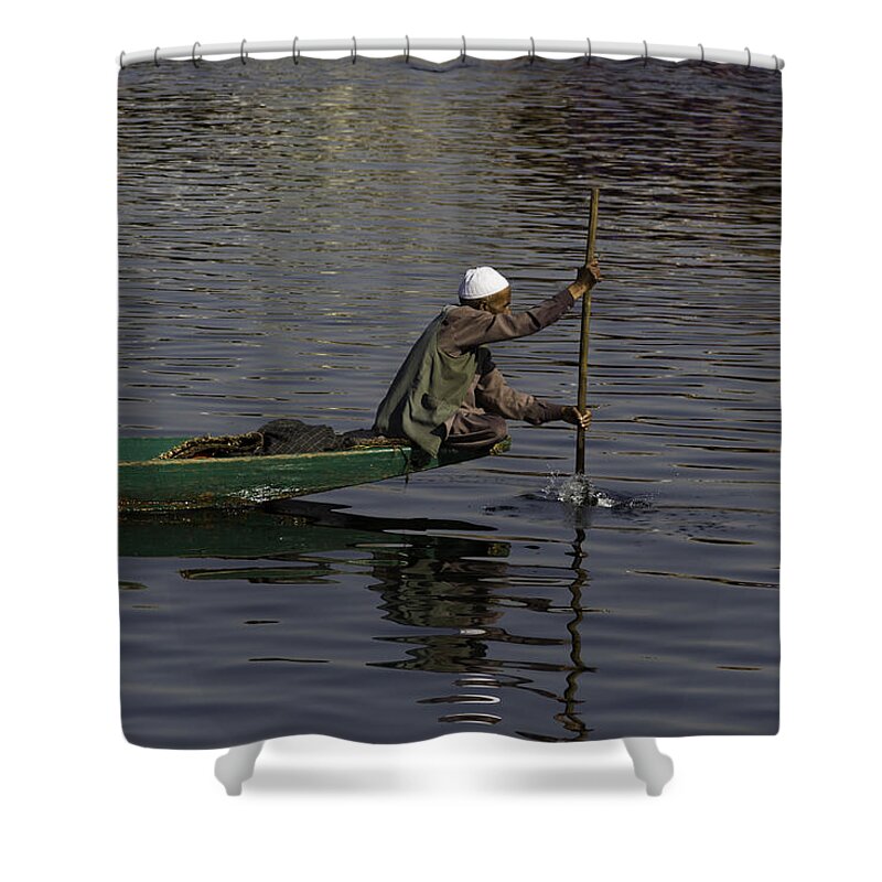 Beautiful Scene Shower Curtain featuring the photograph Man plying a wooden boat on the Dal Lake by Ashish Agarwal