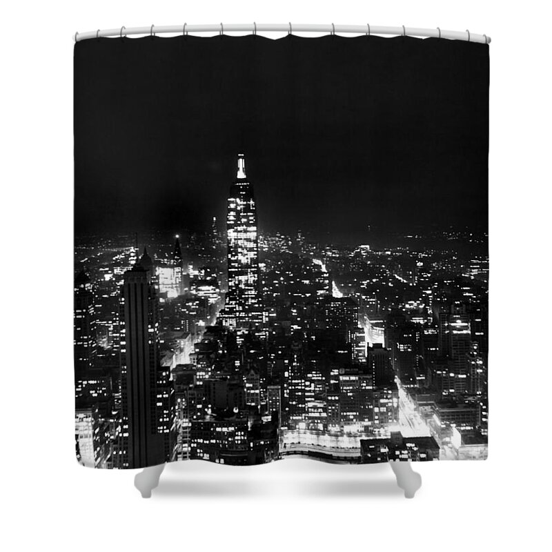 1945 Shower Curtain featuring the photograph Midtown Manhattan At Night by Underwood Archives