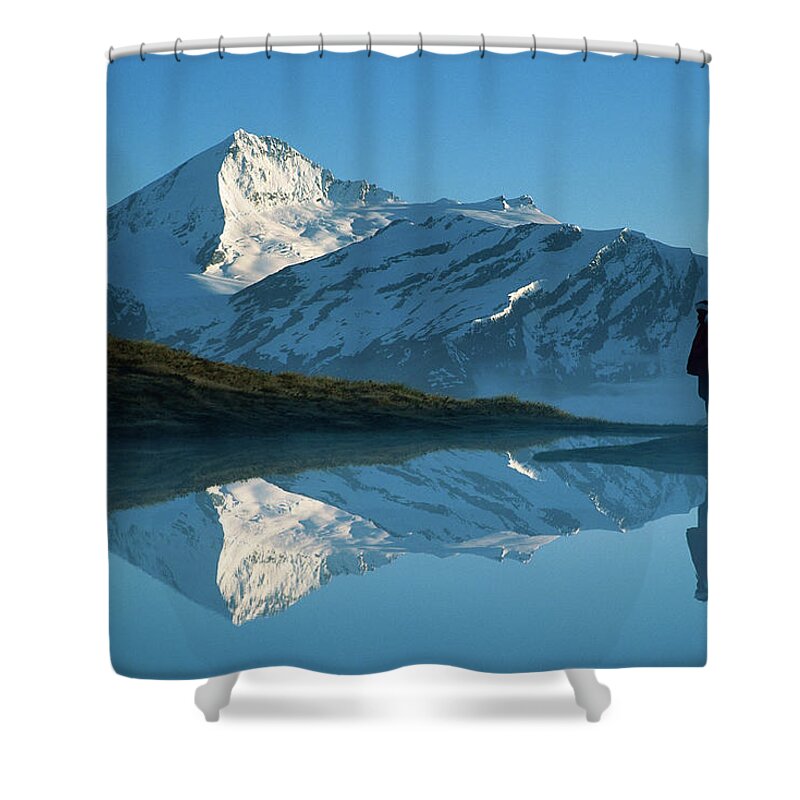 00260031 Shower Curtain featuring the photograph Mt Aspiring And Hiker Reflected In Lake by Colin Monteath