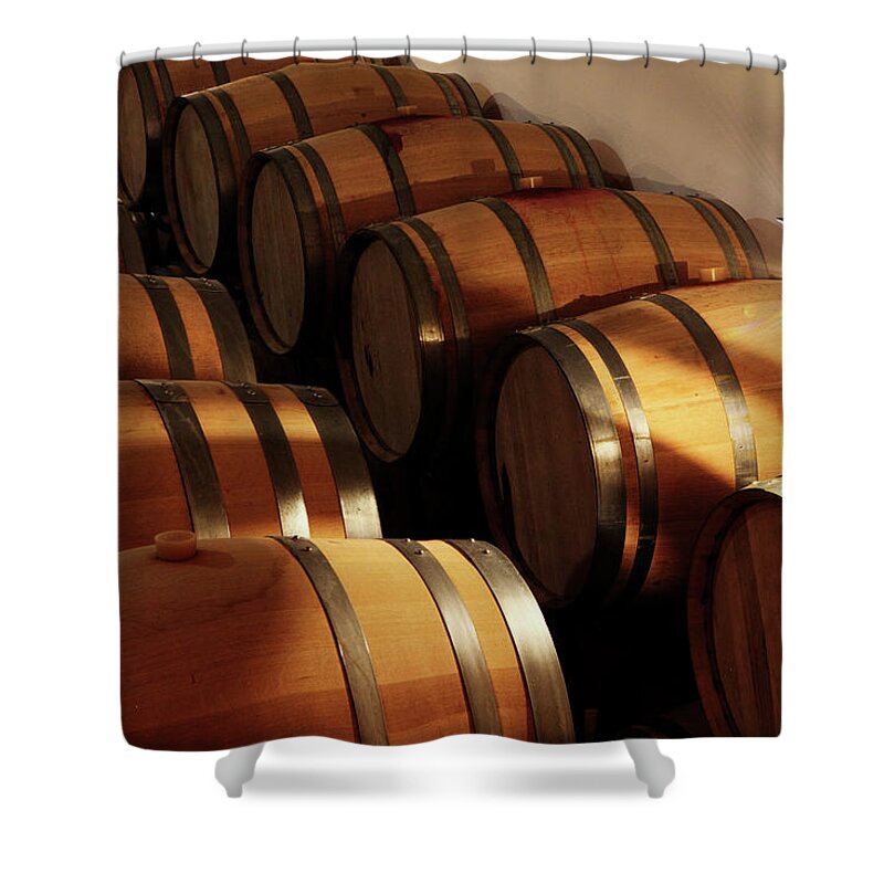 Alcohol Shower Curtain featuring the photograph Oak Barrels In A Cellar by Seraficus