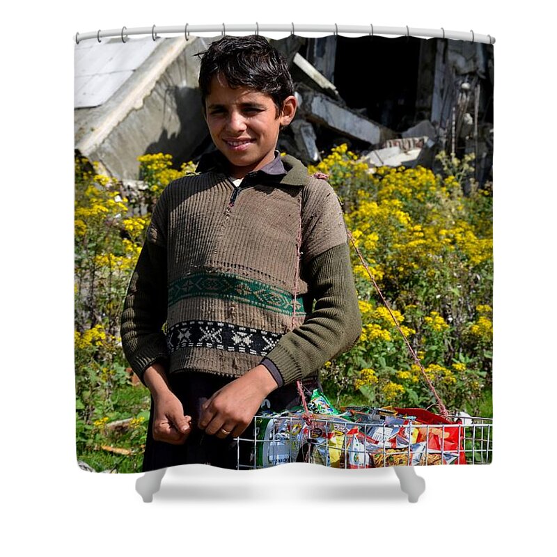 Boy Shower Curtain featuring the photograph Pakistani boy in front of hotel ruins in Swat Valley by Imran Ahmed