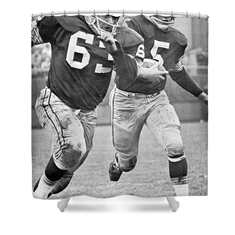 Paul Shower Curtain featuring the photograph Paul Hornung running by Gianfranco Weiss