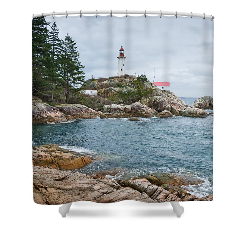 Architecture Shower Curtain featuring the photograph Point Atkinson Lighthouse and Rocky Shore by Jeff Goulden