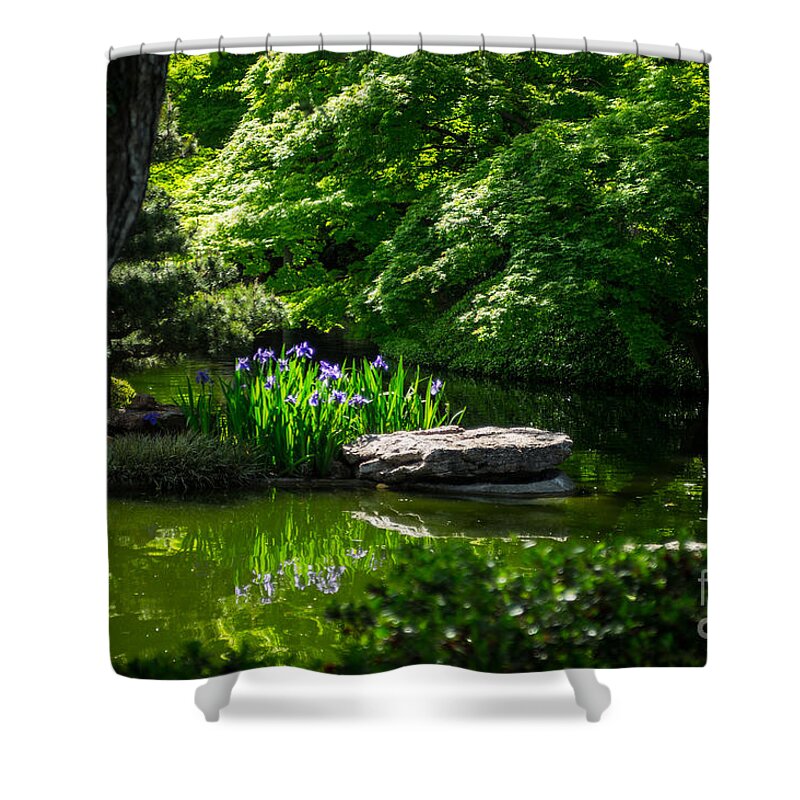 Botanical Gardens Shower Curtain featuring the photograph Purple Iris Amongst Green by Imagery by Charly