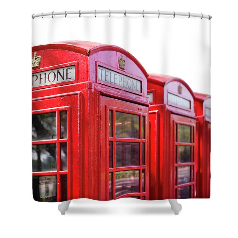 Five Objects Shower Curtain featuring the photograph Red Telephone Boxes Against A White by Richard Boll