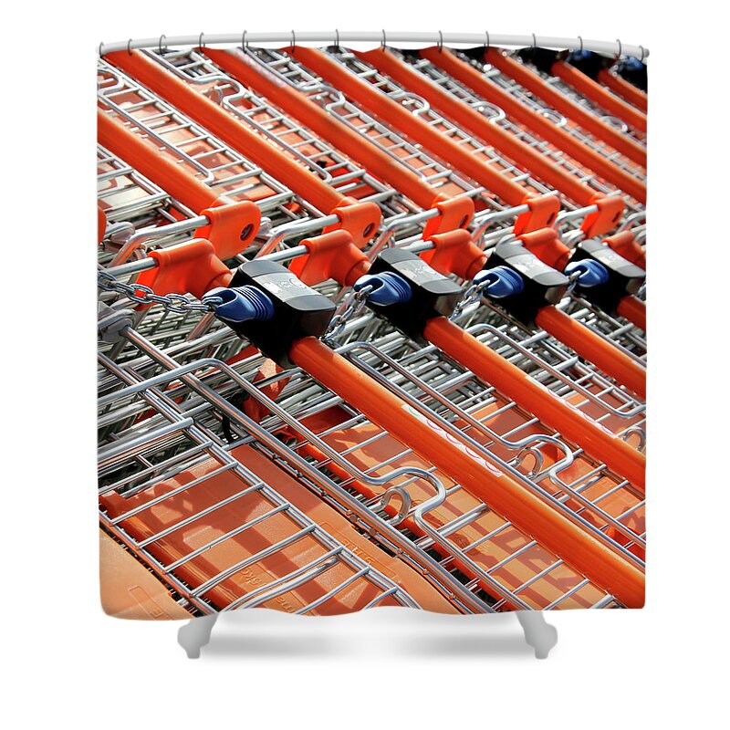 Orange Color Shower Curtain featuring the photograph Retail Shopping Trolleys by Andrea Kennard Photography