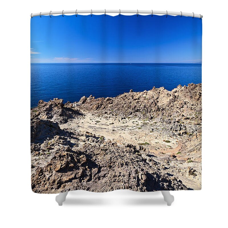 Cape Shower Curtain featuring the photograph rocky coast in San Pietro island by Antonio Scarpi