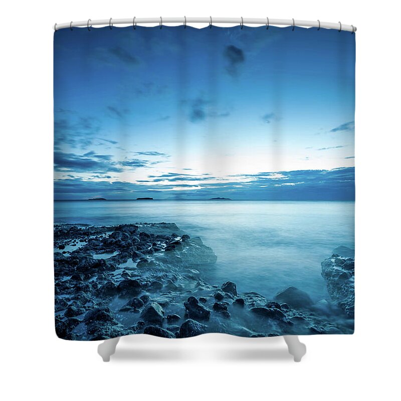 Tranquility Shower Curtain featuring the photograph Serene Blue Beach by Jojo Nicdao