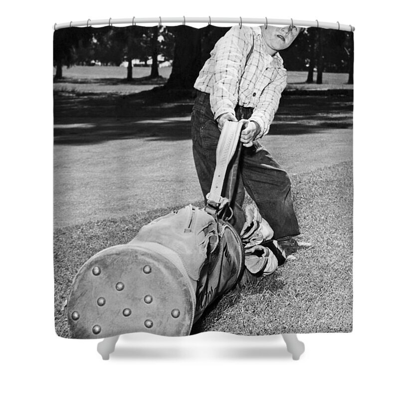 1940s Shower Curtain featuring the photograph Small Boy Totes Heavy Golf Bag by Underwood Archives