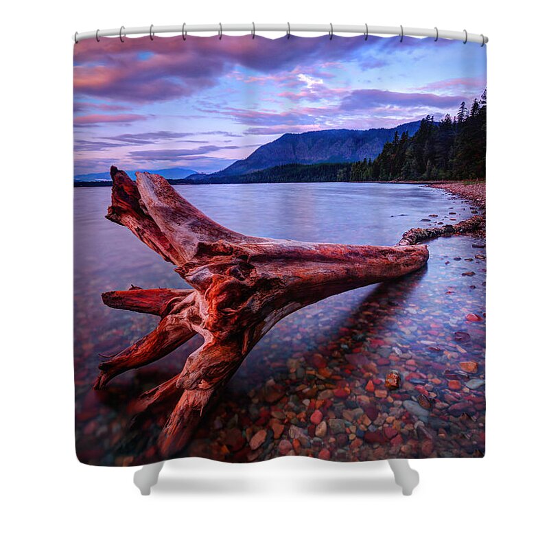 Sunrise Shower Curtain featuring the photograph sunrise on Lake McDonald by Jaki Miller