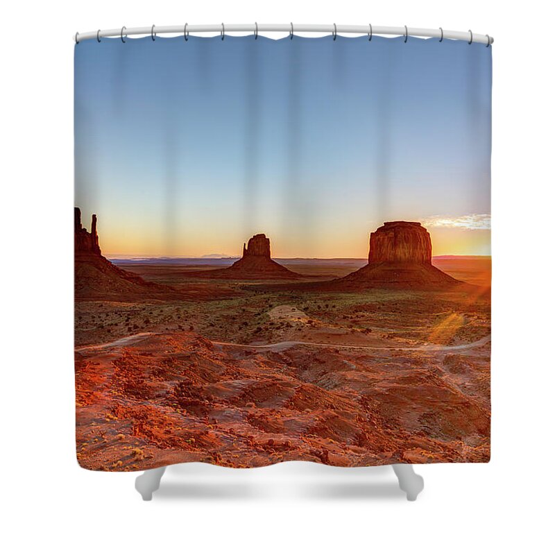 Tranquility Shower Curtain featuring the photograph Sunrise On Monument Valley by Loic Lagarde