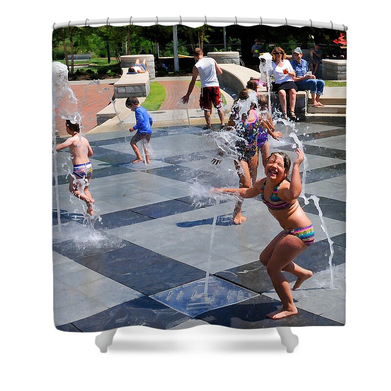 Child Playing In Water Fountain Shower Curtain featuring the photograph Joyful Young Girl Playing in Fountain by Ginger Wakem