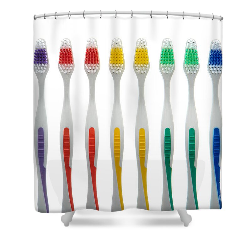 Toothbrush Shower Curtain featuring the photograph Toothbrushes by Olivier Le Queinec
