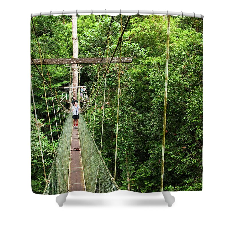 Tropical Rainforest Shower Curtain featuring the photograph Tourists Walking On Mulu Canopy Skywalk by Anders Blomqvist
