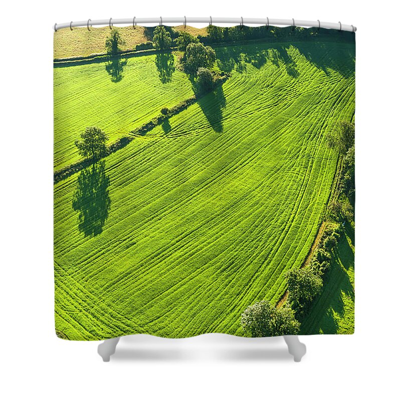 Scenics Shower Curtain featuring the photograph Vibrant Green Pasture Patchwork Fields by Fotovoyager