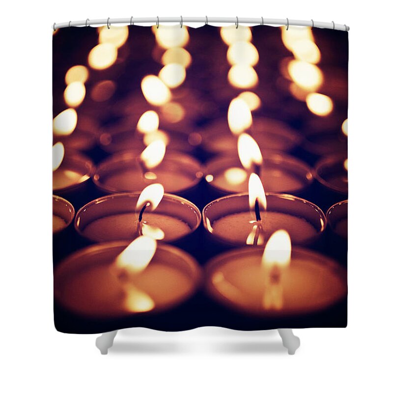 In A Row Shower Curtain featuring the photograph Votive Candles by Urbanglimpses