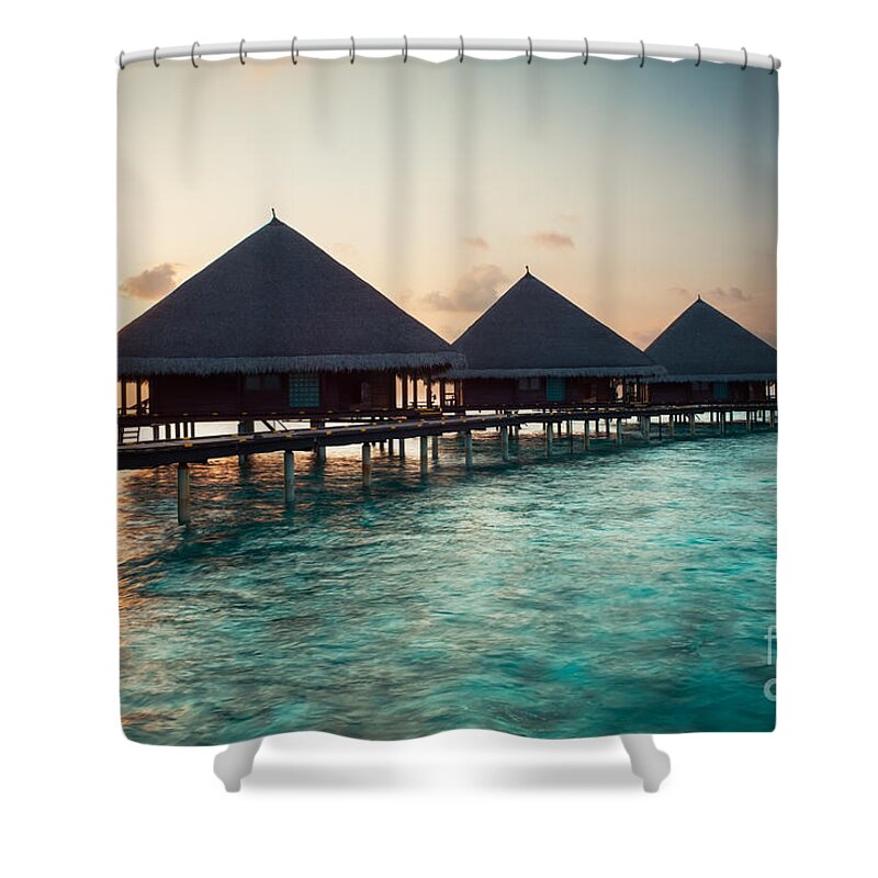 Amazing Shower Curtain featuring the photograph Waterbungalows At Sunset by Hannes Cmarits