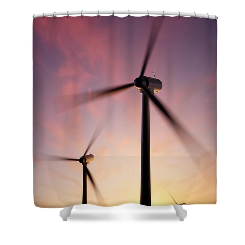 Wind Shower Curtain featuring the photograph Wind Turbine blades spinning at sunset by Johan Swanepoel