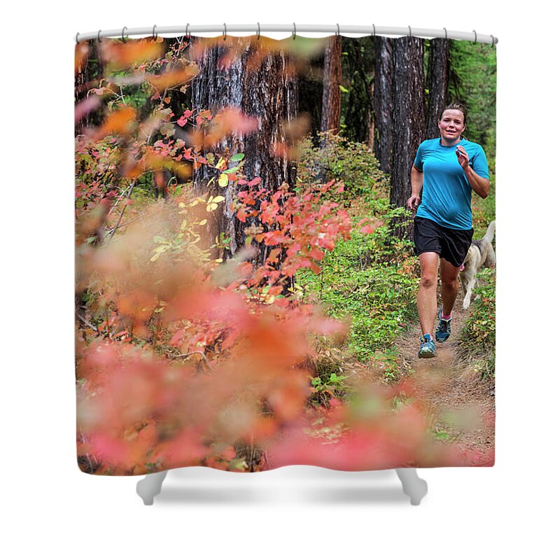 Rattlesnake Mountains Shower Curtain featuring the photograph Woman Jogging In Forest, Rattlesnake by Robin Carleton