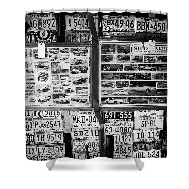 Vintage License Plates Shower Curtain featuring the photograph Studebakers on auction #2 by Toni Hopper