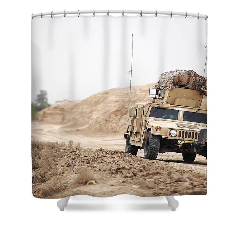 Trucks Shower Curtain featuring the photograph A Humvee Conducts Security by Stocktrek Images