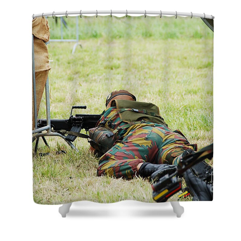 5.56mm Shower Curtain featuring the photograph A Soldier Of The Belgian Army On Guard by Luc De Jaeger