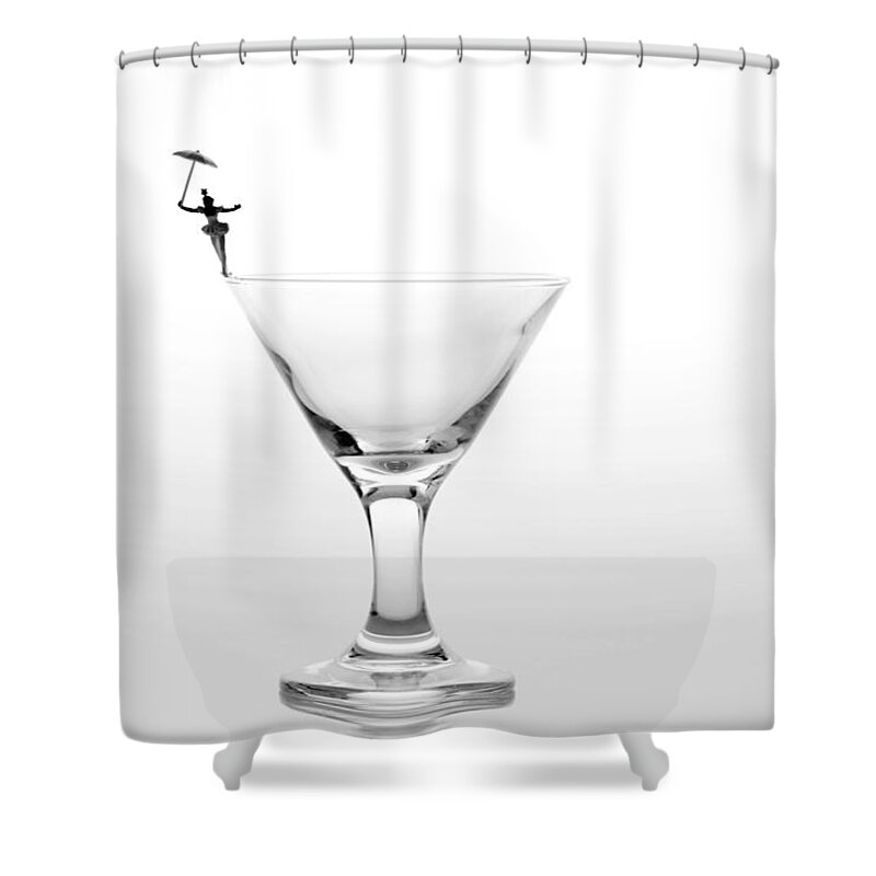 Black Shower Curtain featuring the photograph Circus balance game on cup edge by Paul Ge