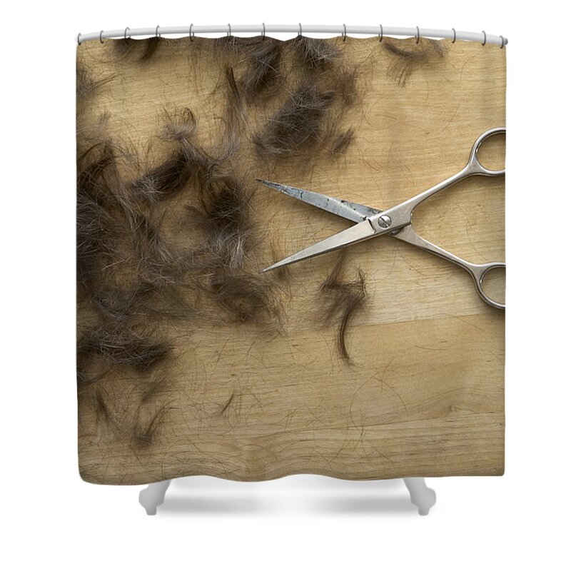 Hair Shower Curtain featuring the photograph Hair and scissors on table by Matthias Hauser