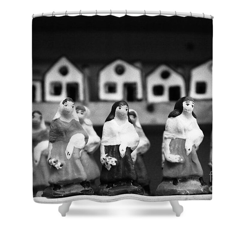 Figurines Shower Curtain featuring the photograph Handpainted figurines by Gaspar Avila