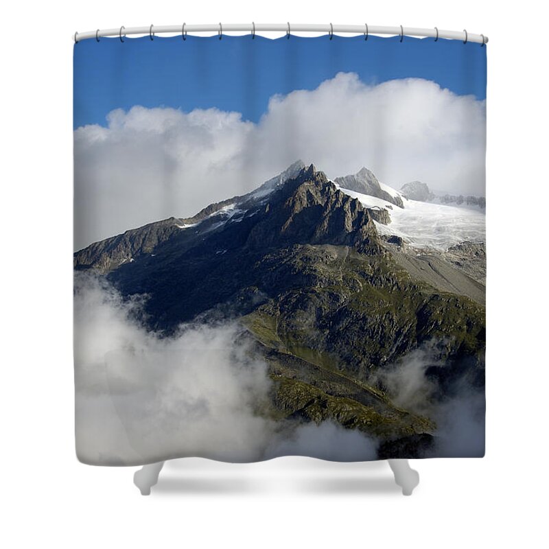 Mountain Shower Curtain featuring the photograph Mountain top in the clouds by Matthias Hauser