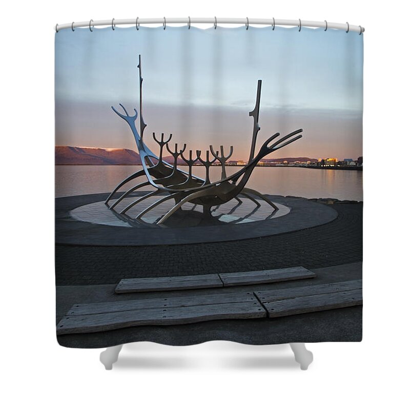 Solfar Shower Curtain featuring the photograph Silver ship sculpture at dusk by Sven Brogren