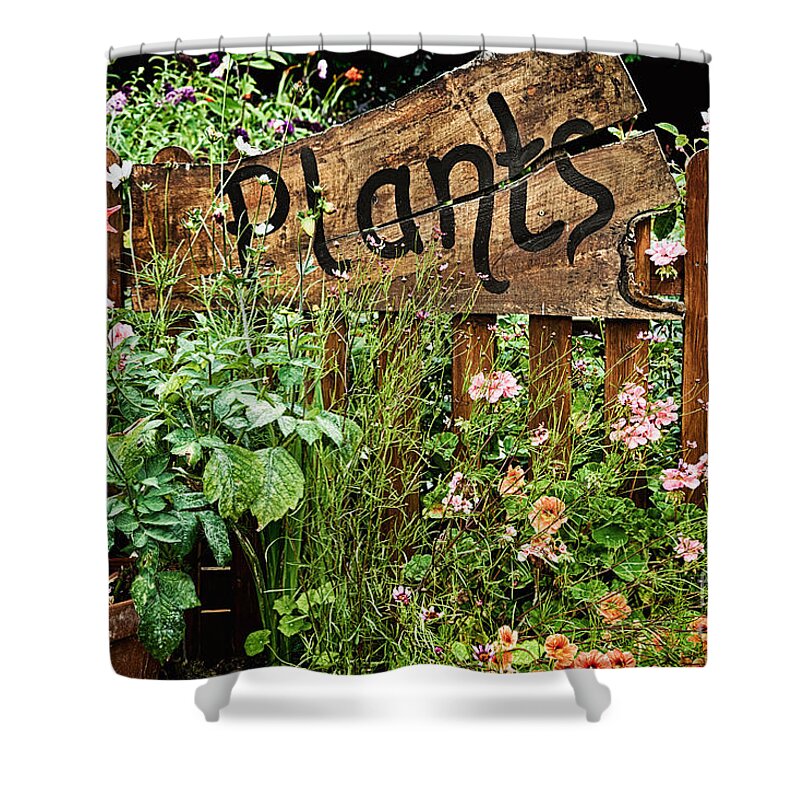 Plants Shower Curtain featuring the photograph Wooden plant sign in flowers by Simon Bratt