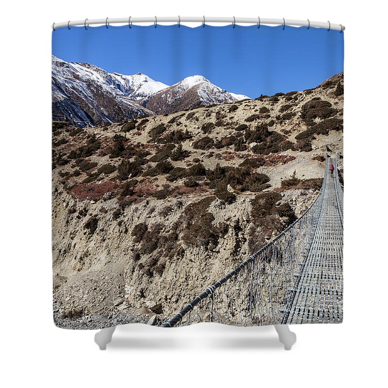 Annapurna Circuit Shower Curtain featuring the photograph Suspension bridge along the Annapurna circuit trek #1 by Didier Marti