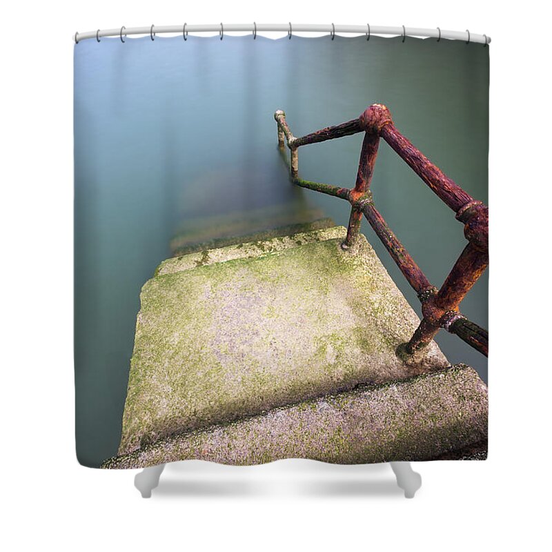 Railing Shower Curtain featuring the photograph Rusty Handrail Going Down On Water #2 by Mikel Martinez de Osaba