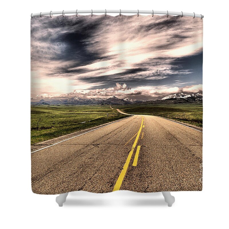Road Shower Curtain featuring the photograph A long road to the mountains by Jeff Swan